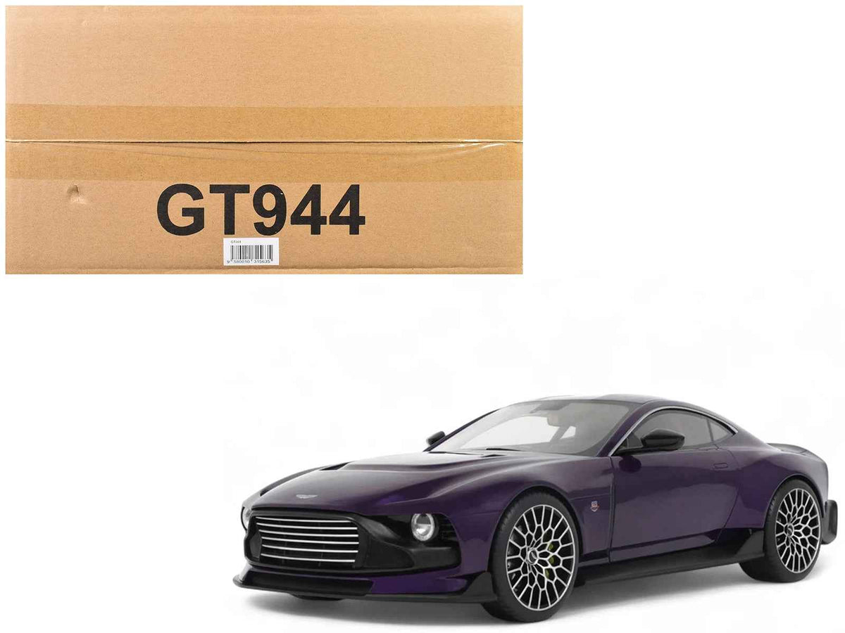 Detailed 1/18 scale Aston Martin Valour model car in purple metallic by GT Spirit, featuring accurate design and craftsmanship.