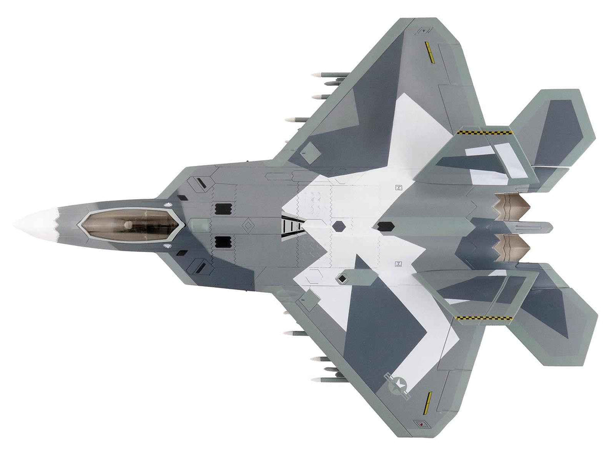 Lockheed F-22 Raptor stealth aircraft diecast model in splinter camouflage by Hobby Master, U.S. Air Force, 1/72 scale.