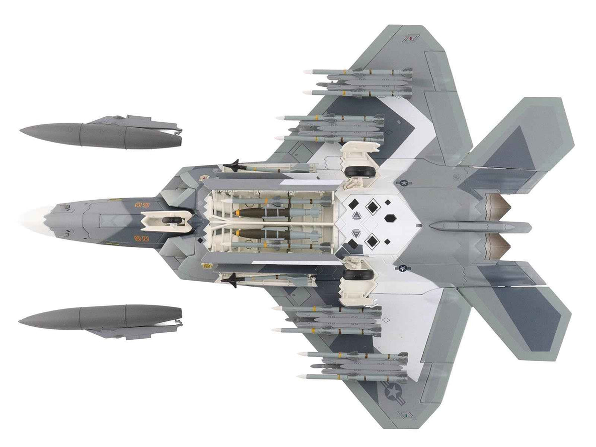 Lockheed F-22 Raptor stealth aircraft model in splinter camouflage by Hobby Master, detailed 1/72 diecast United States Air Force jet