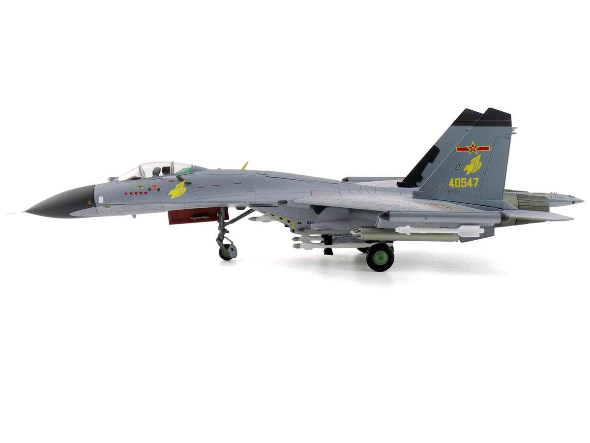 1/72 scale diecast model of Shenyang J-11A fighter aircraft with golden helmet, part of Hobby Master's Air Power Series.