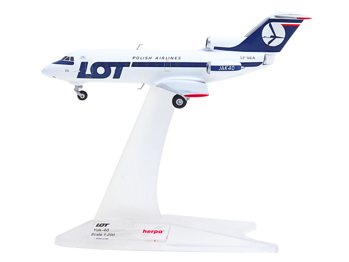 Yakovlev Yak-40 miniature model by Miniature Motors, white with blue stripes and tail, detailed diecast aircraft replica.