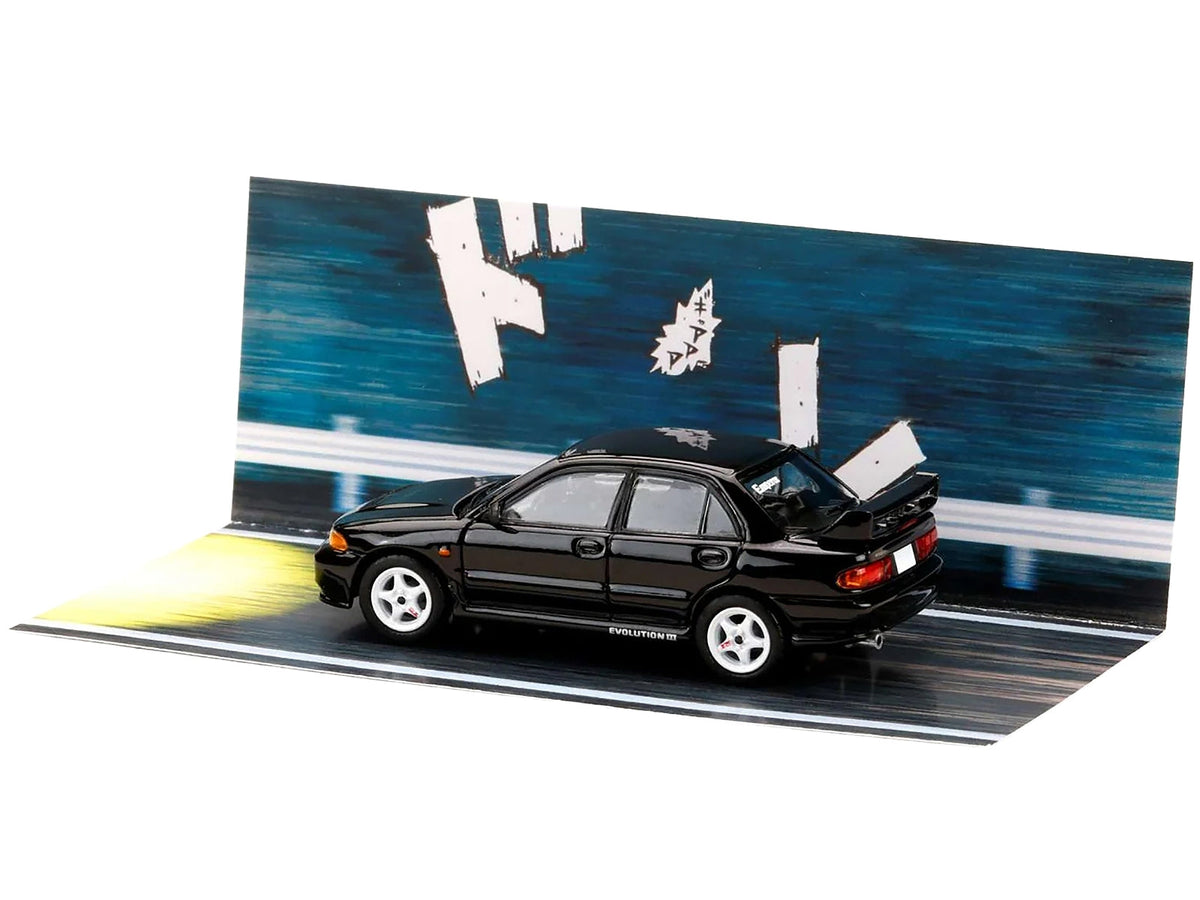 Black Mitsubishi Lancer RS Evolution III RHD diecast model car by Miniature Motors, from the "Initial D" Diorama Series in 1/64 scale.