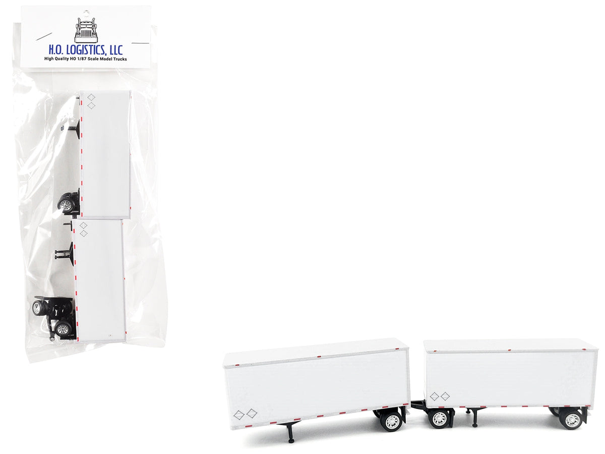 Set of two white 28-foot dry van double pup trailers in HO scale plastic model by Miniature Motors, detailed accessories for model trains.