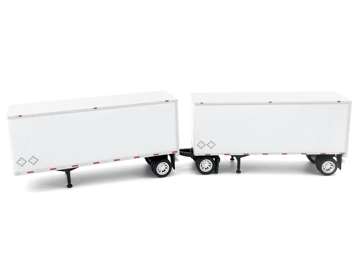 Set of two white 28' Dry Van Double Pup Trailers miniature model by Miniature Motors, HO scale plastic accessories for model train setups.