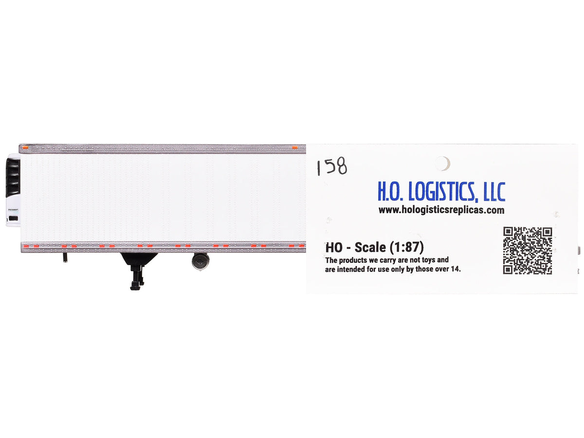 White 1/87 scale box trailer with reefer unit, HO Logistics miniature model by Miniature Motors, detailed plastic accessory for model trains.