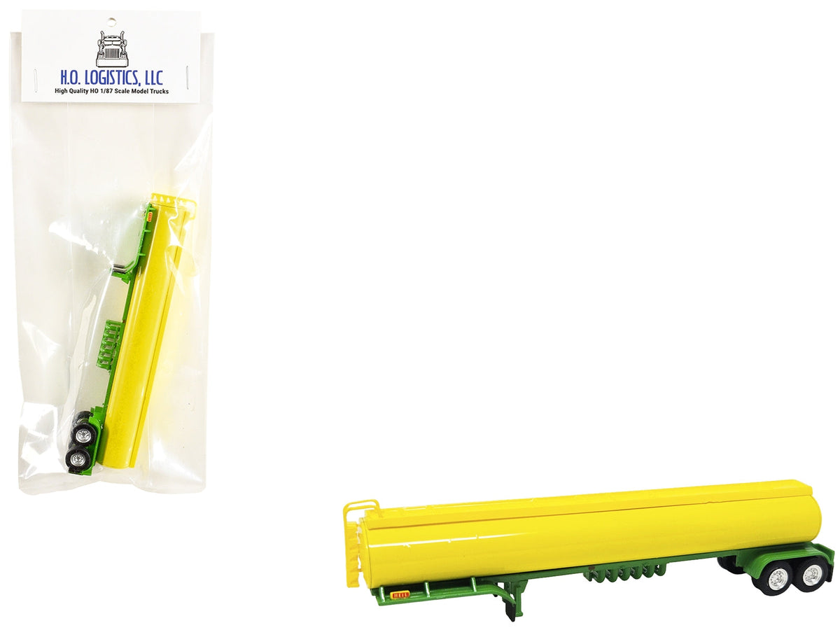 Yellow and green 1/87 scale tanker trailer plastic model by Miniature Motors, detailed HO Logistics accessory for model train setups.