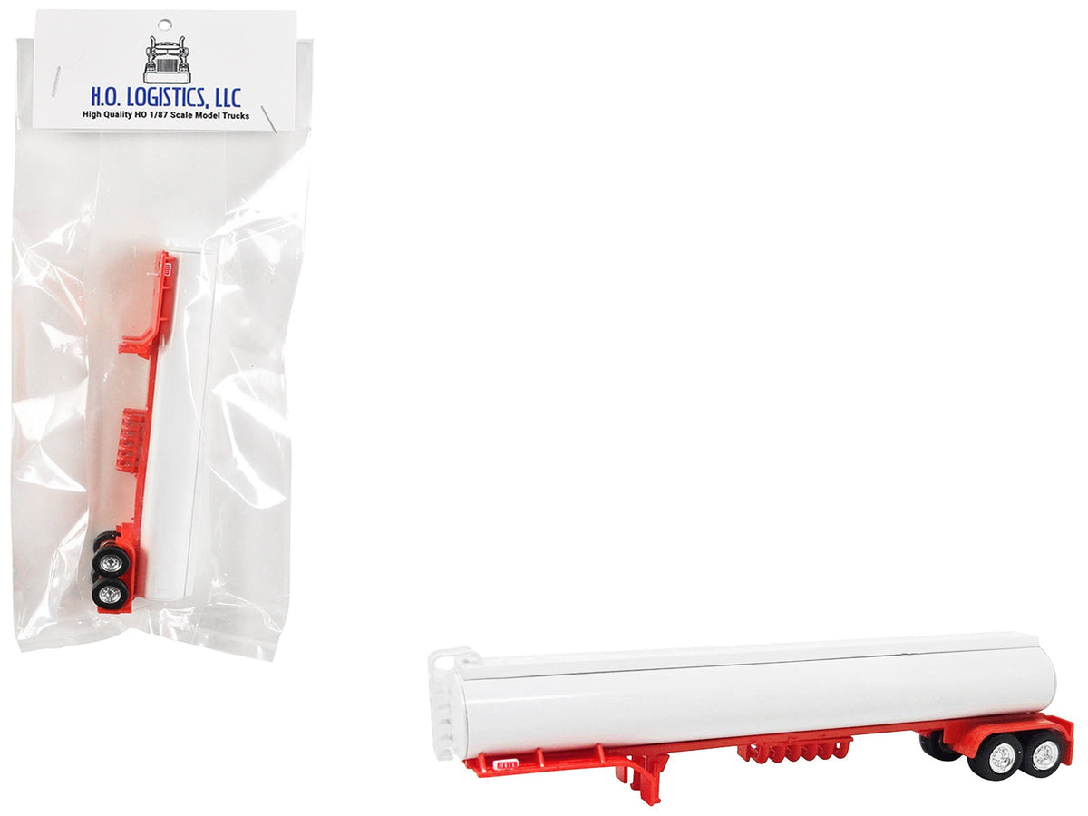White and red 1/87 scale plastic tanker trailer model by Miniature Motors, designed as HO scale accessories for model train setups.