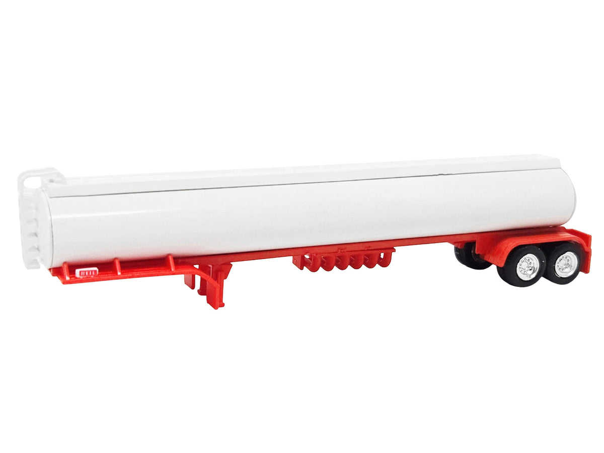 White and red 1/87 scale tanker trailer plastic model by Miniature Motors, detailed HO Logistics accessory for model train setups.