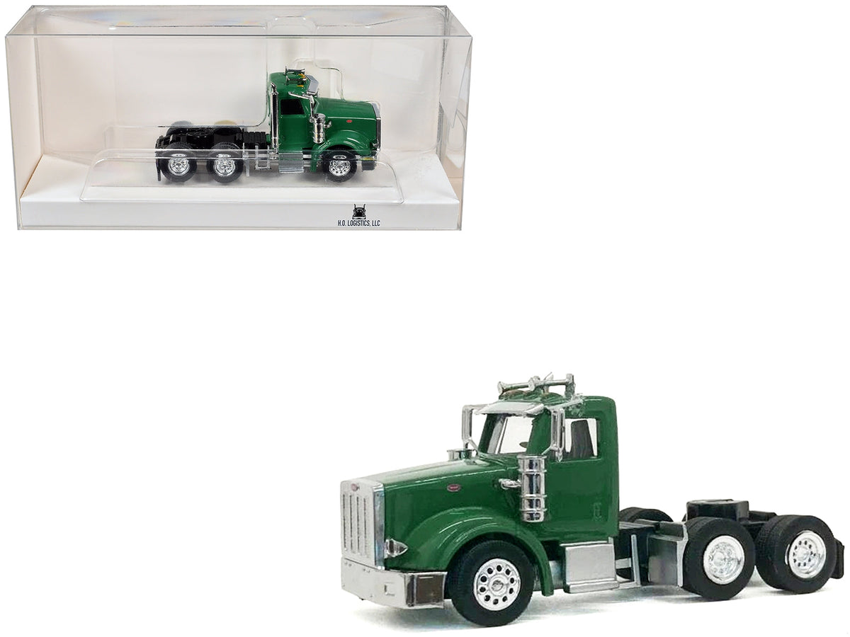 Green Peterbilt 367 Day Cab model in 1/87 scale by Miniature Motors, detailed plastic model of the Peterbilt truck.