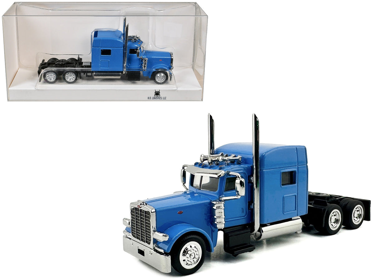 Miniature Baby Blue Peterbilt 389 truck tractor with sleeper cab, HO scale plastic model by Miniature Motors, detailed and realistic.