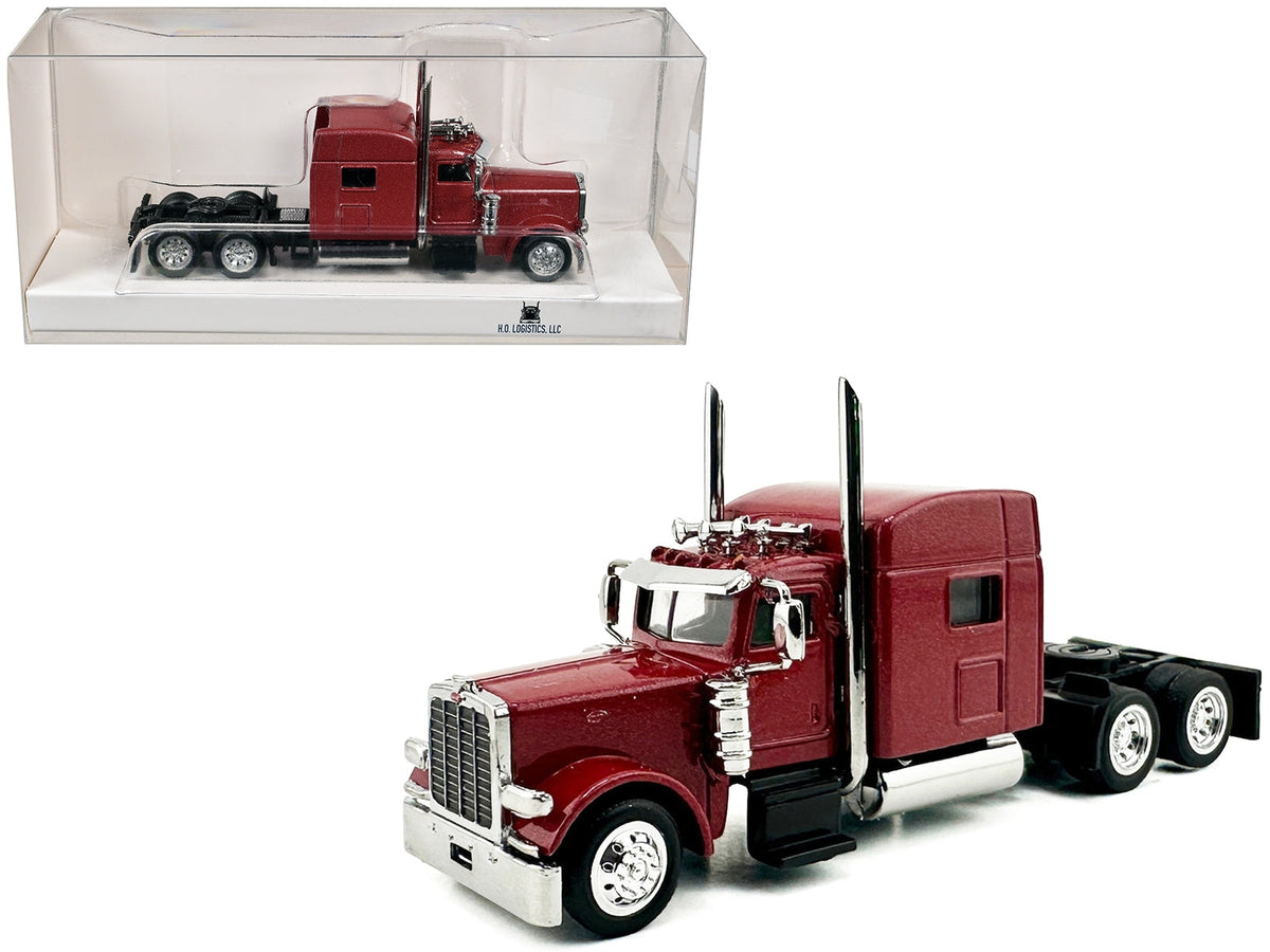 Red metallic Peterbilt 389 truck tractor with sleeper cab, 1/87 scale plastic model by Miniature Motors, detailed HO scale model.