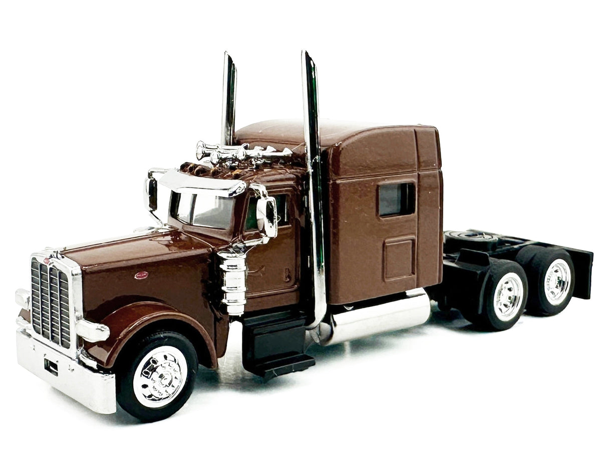 Brown metallic Peterbilt 389 truck tractor with sleeper cab, HO scale plastic model by Miniature Motors, detailed and realistic.