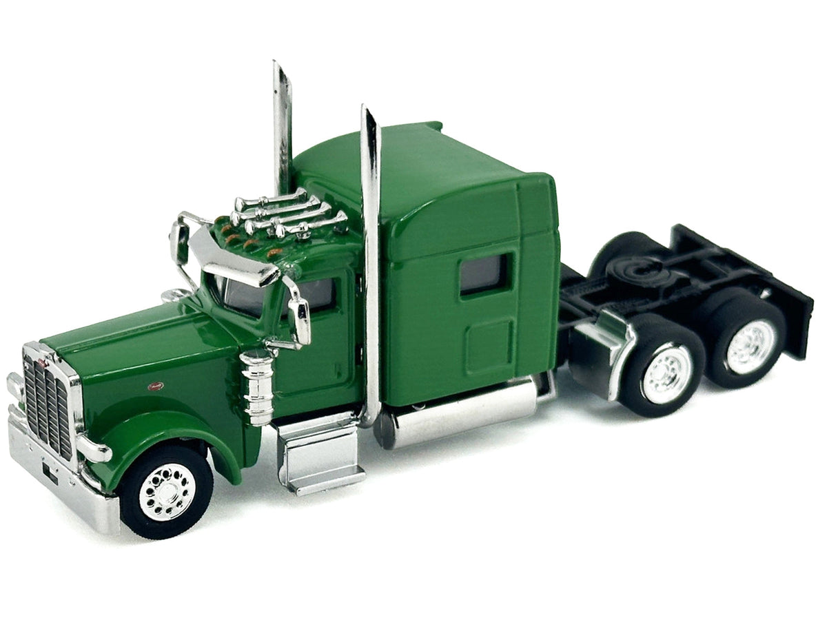 Green Peterbilt 389 truck tractor with sleeper cab miniature model by Miniature Motors, detailed 1/87 scale plastic car.