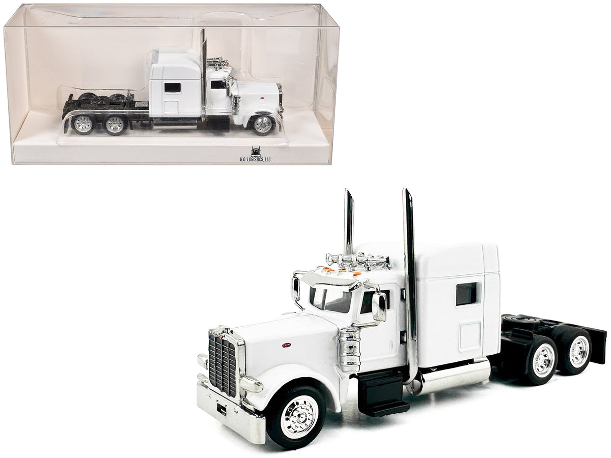 White Peterbilt 389 truck tractor with sleeper cab miniature model by Miniature Motors, detailed 1/87 scale plastic model car.