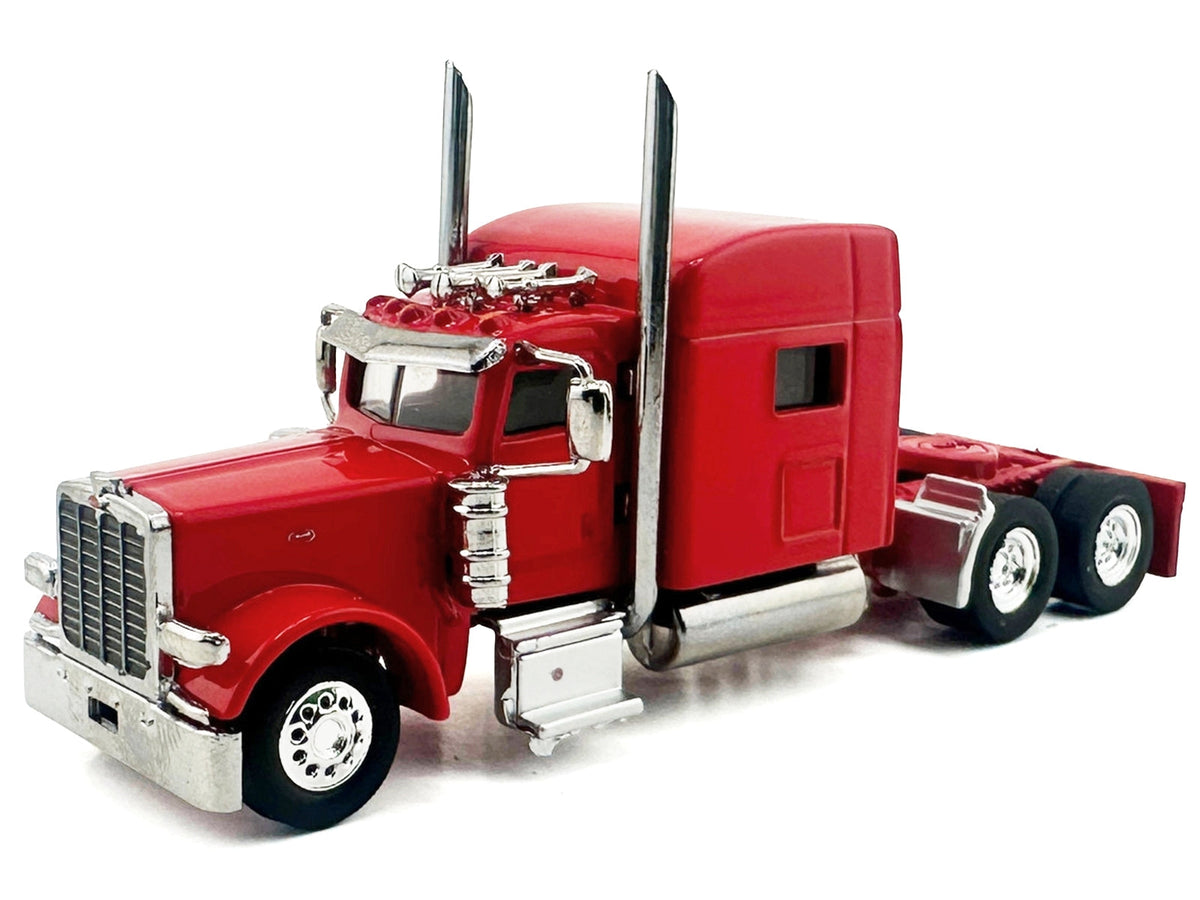 Red Peterbilt 389 truck tractor model with sleeper cab in 1/87 scale by Miniature Motors, detailed plastic model car.