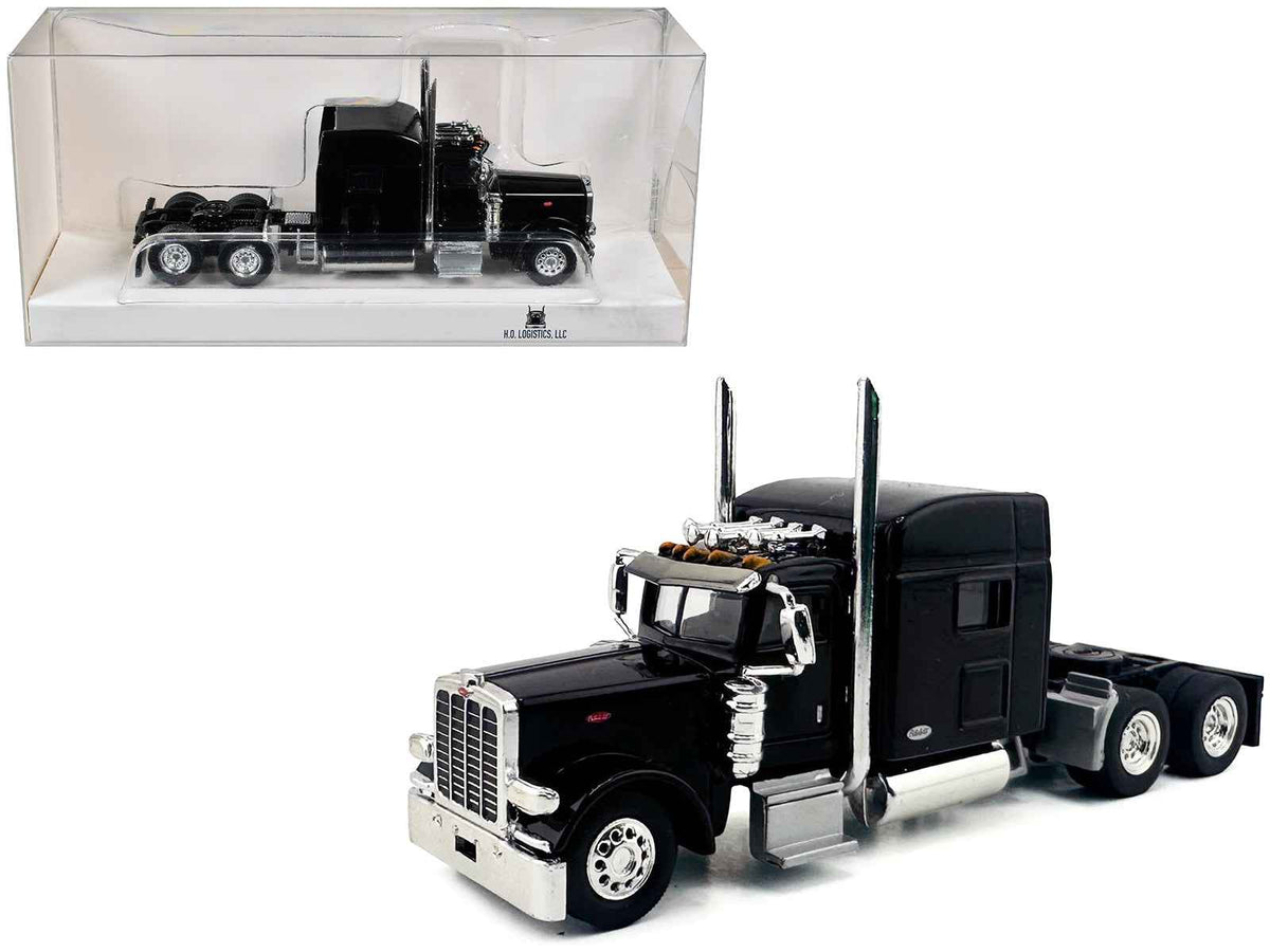 Black Peterbilt 389 truck tractor model with sleeper cab, detailed 1/87 scale plastic car by Miniature Motors.