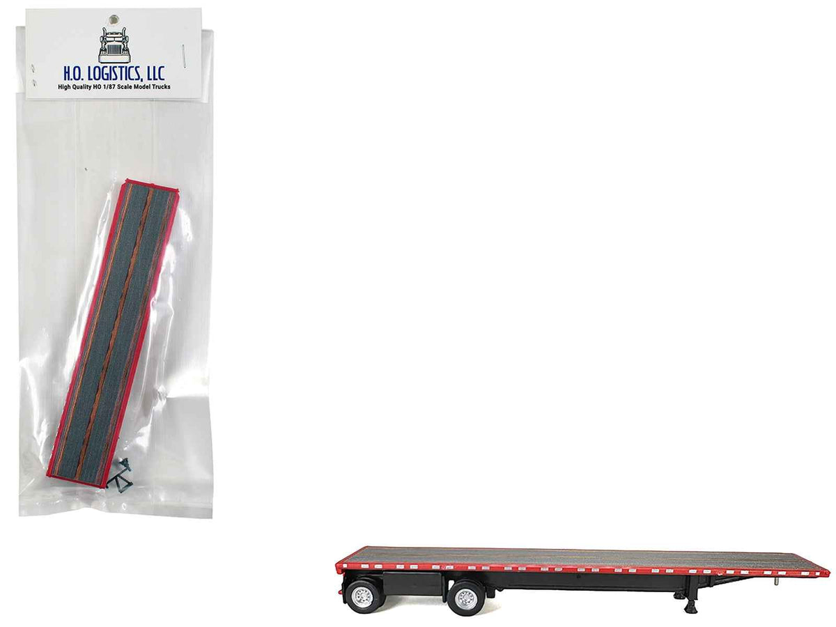 Red 1/87 High Boy Spread Axle Flatbed Trailer plastic model from Miniature Motors, detailed HO Logistics accessory for model cars.