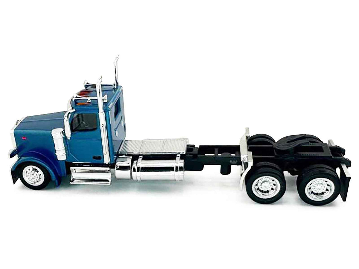 Blue metallic Peterbilt 589 2-axle day cab model by Miniature Motors, detailed 1/87 scale plastic truck for collectors.