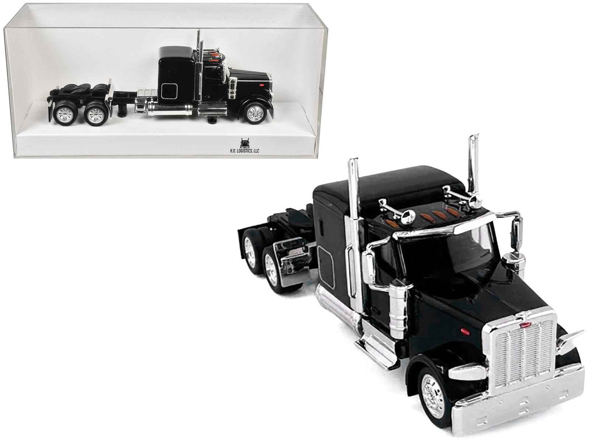 Black Peterbilt 589 truck model with 72-inch sleeper in 1/87 scale by Miniature Motors, detailed plastic HO model car.