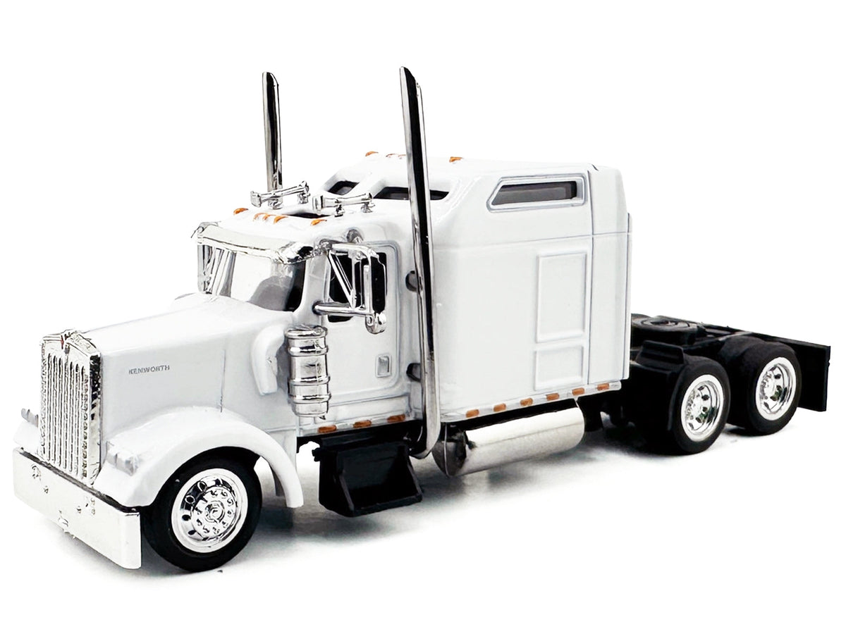 White Kenworth W900L truck tractor model with sleeper cab in 1/87 scale by Miniature Motors, detailed plastic model car.
