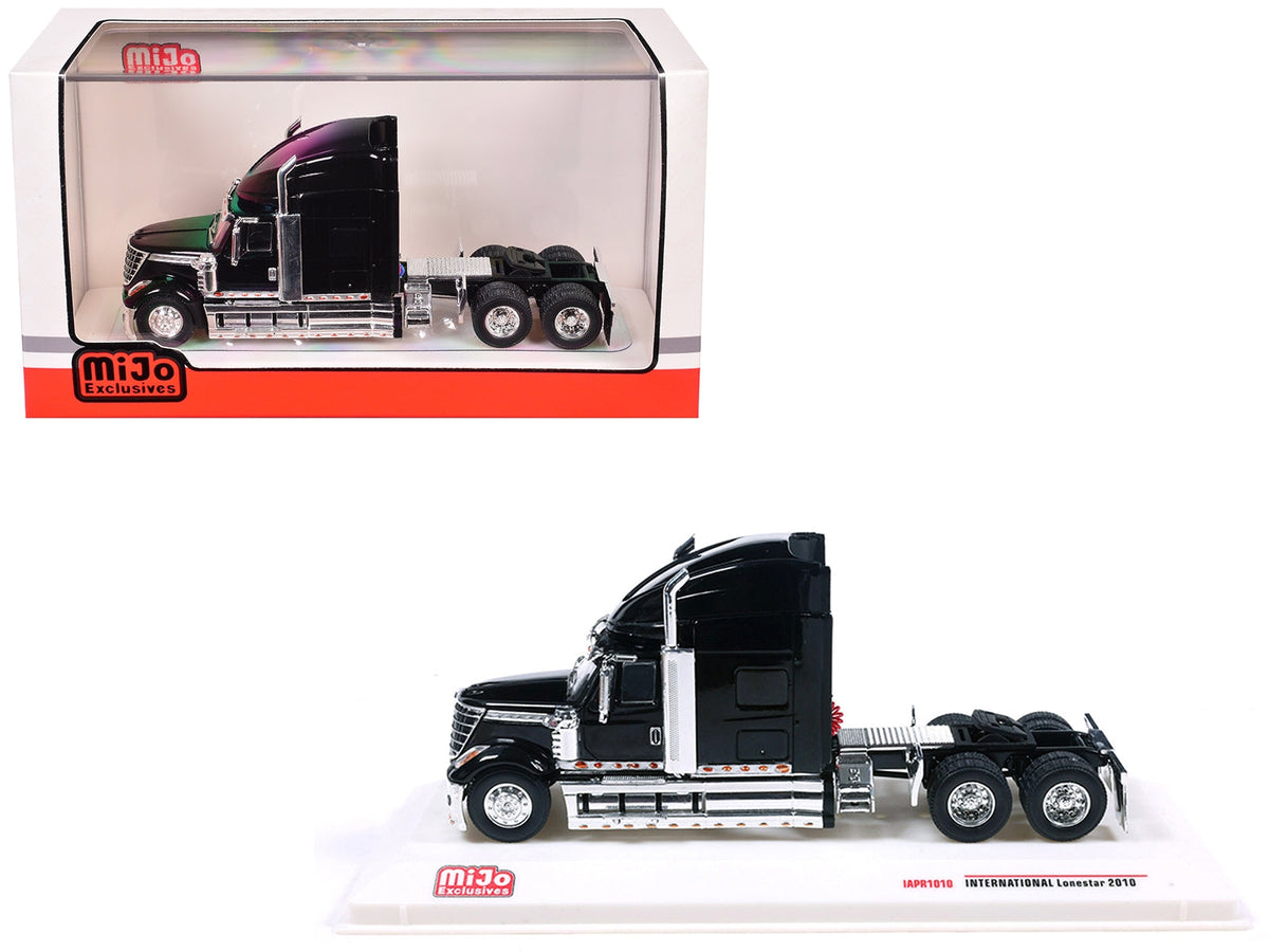 Black 2010 International Lonestar truck tractor diecast model by IXO Models, 1/64 scale, detailed miniature vehicle.