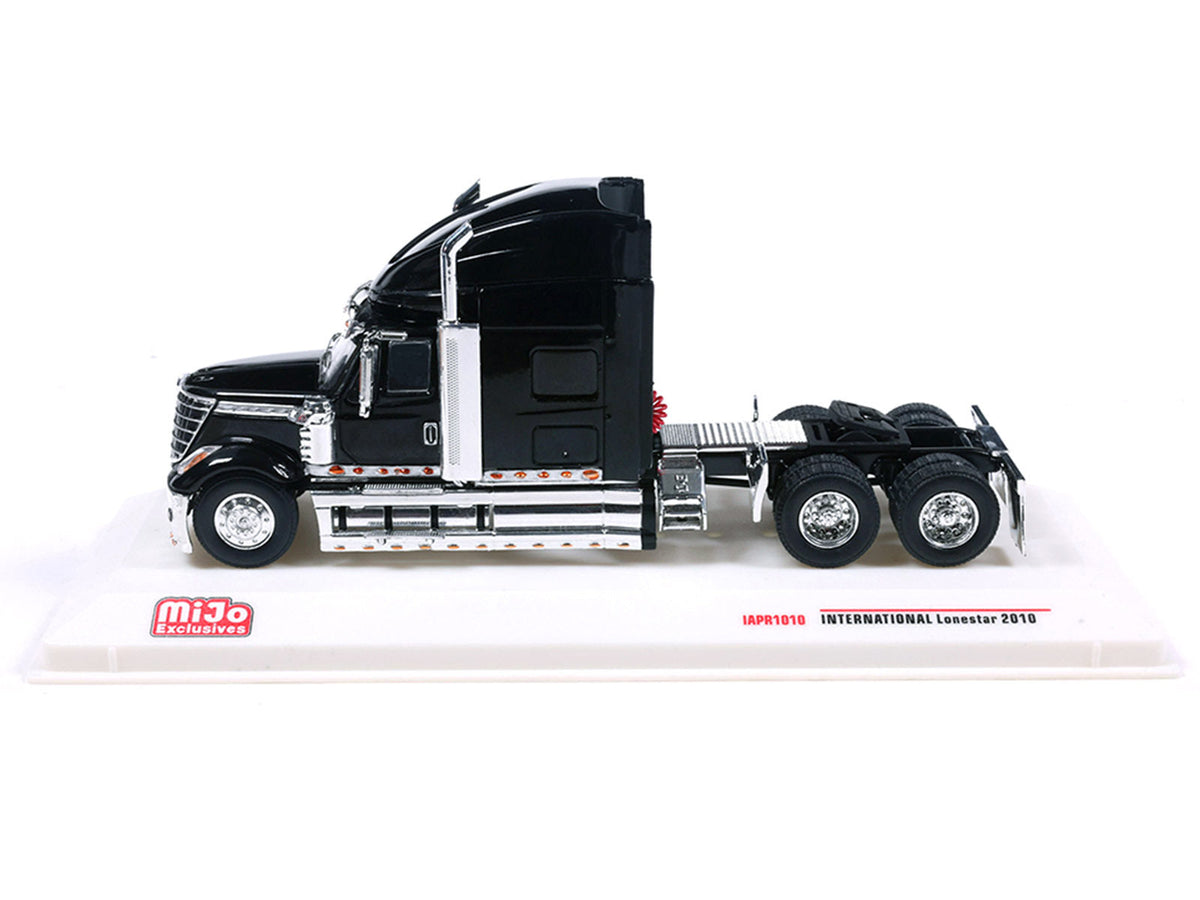 Black 2010 International Lonestar Truck Tractor diecast model by IXO Models, detailed miniature International Models truck in 1/64 scale.
