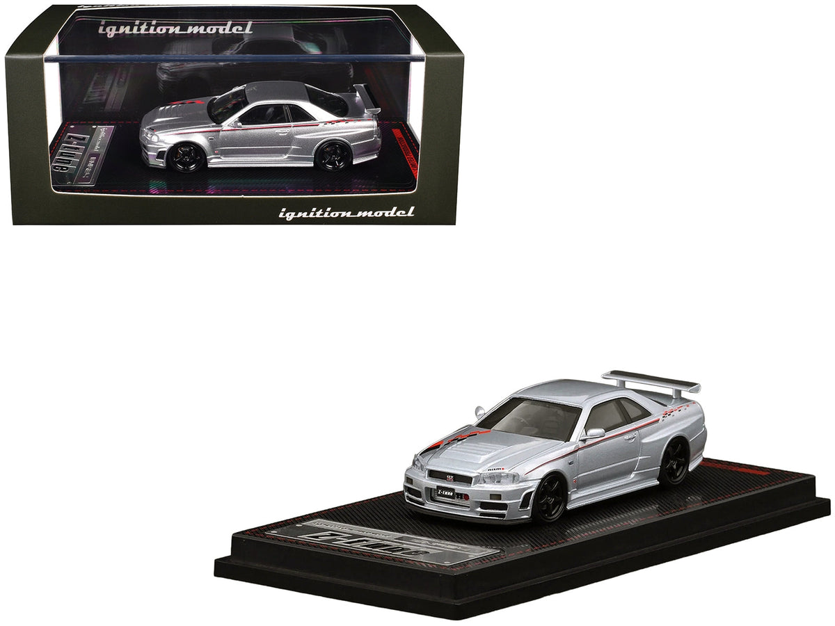 Silver metallic Nissan Skyline GT-R BNR34 Z-Tune diecast model car by Miniature Motors, detailed view of right-hand drive 1/64 scale.