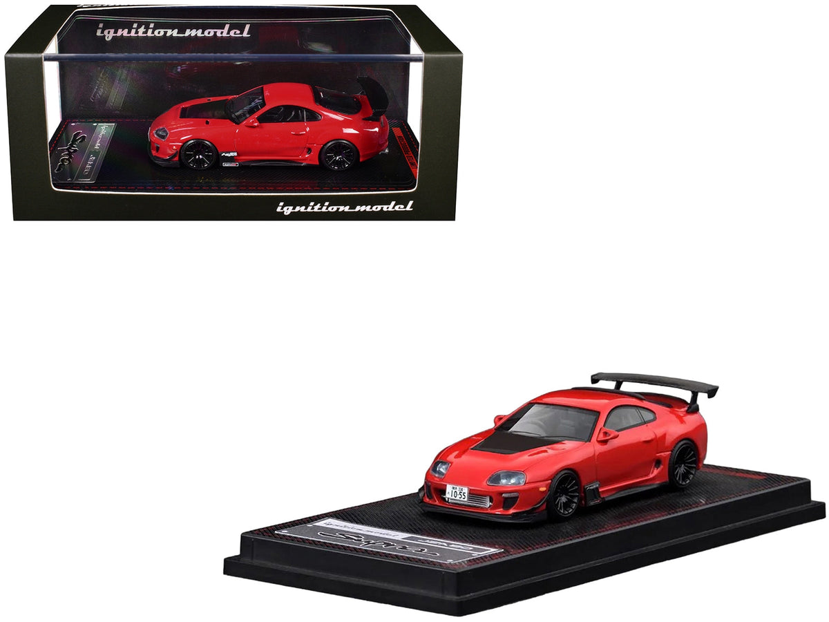 Red Toyota Supra JZA80 RZ diecast model car by Miniature Motors, detailed 1/64 scale with carbon hood, right-hand drive.