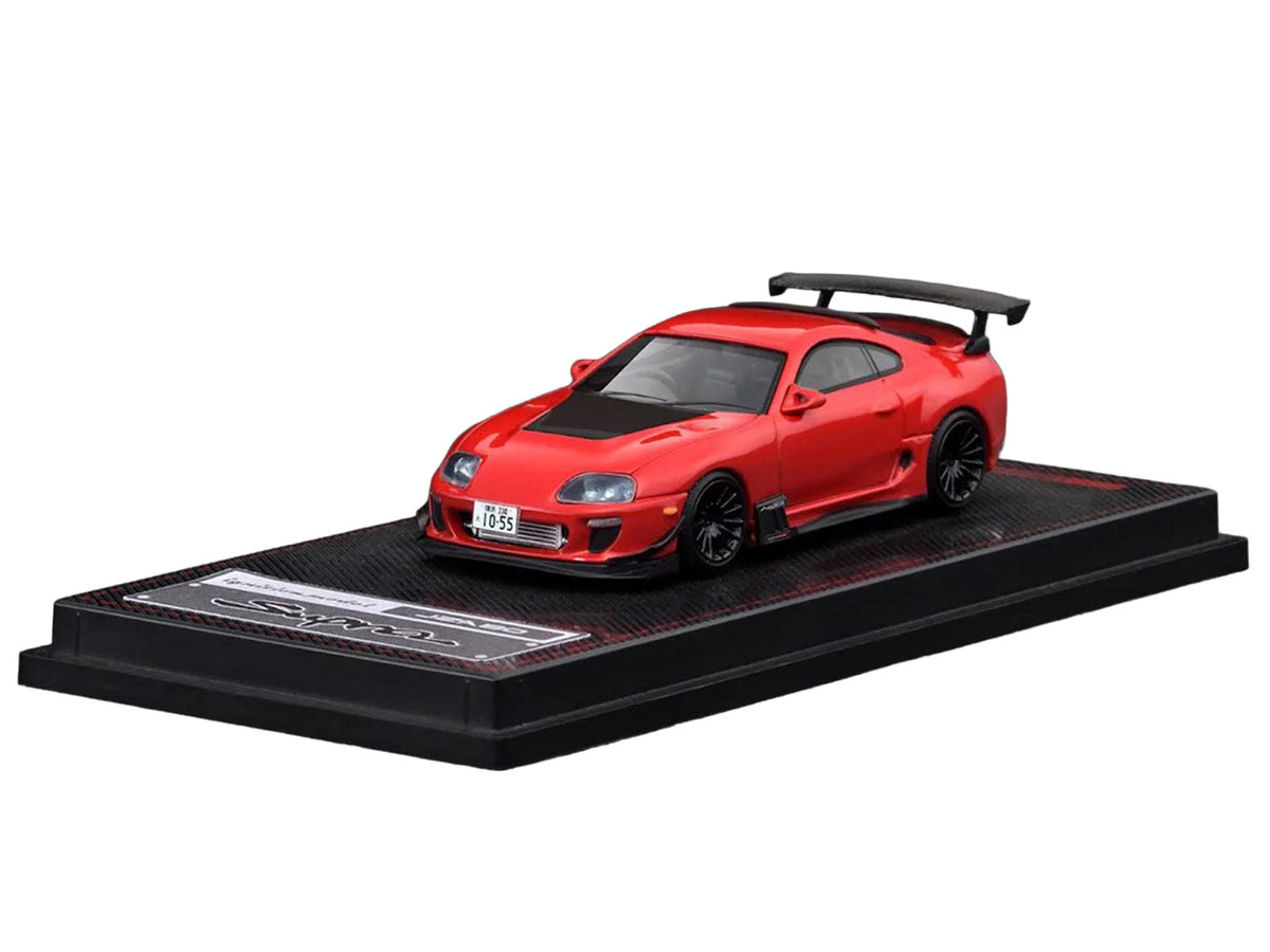 Red Toyota Supra JZA80 RZ diecast model car with carbon hood, right-hand drive, 1/64 scale by Ignition Model, detailed miniature vehicle.