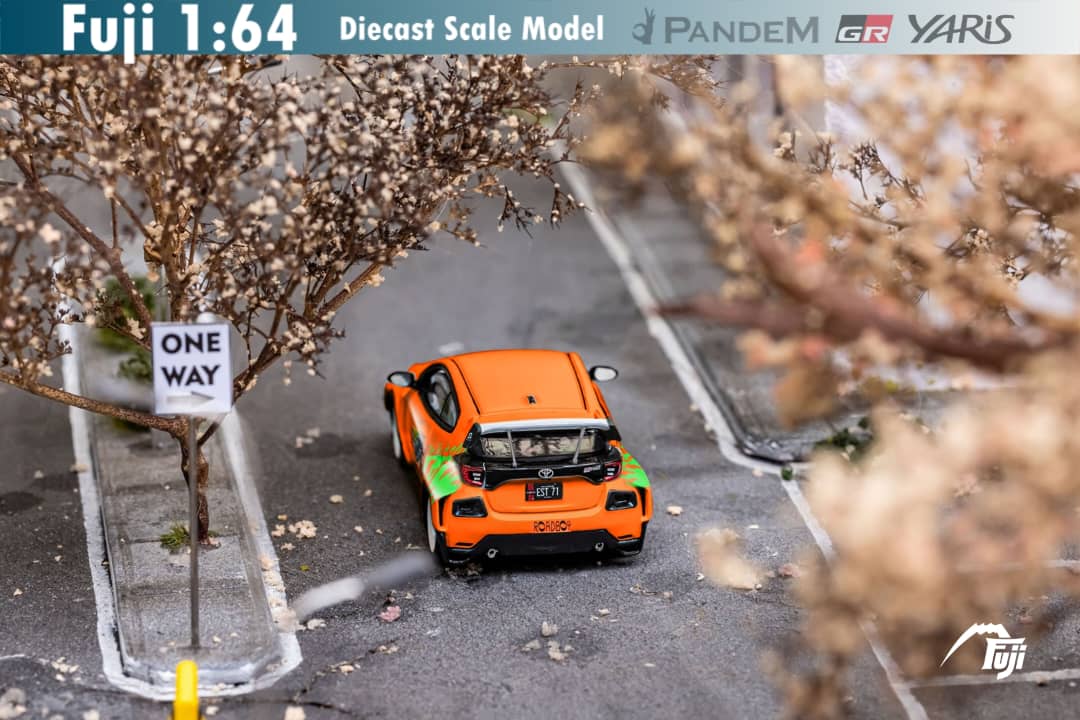 Diecast Toyota Yaris GR in Fast & Furious livery, 1:64 scale by Lot57Supplies Diecast Shop, detailed model car image.