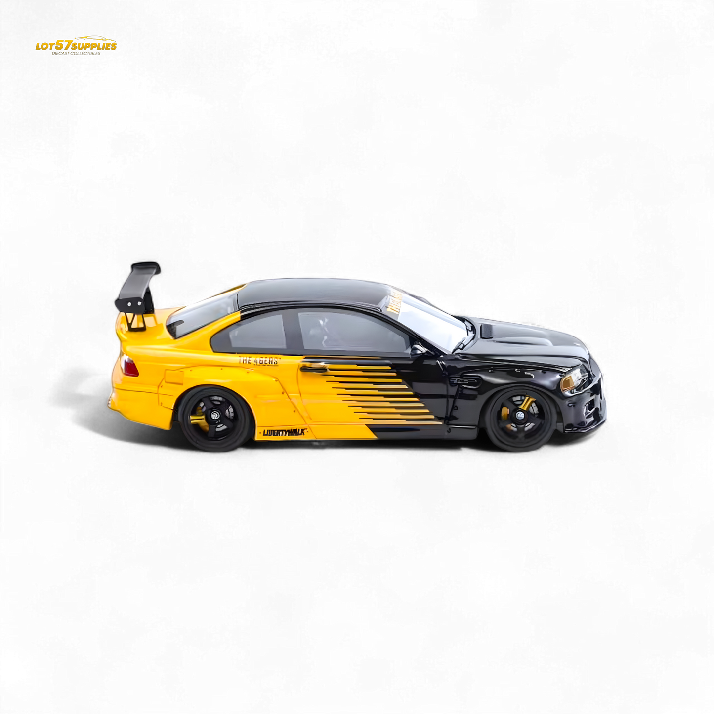 Diecast BMW M3 E46 widebody model by Lot57Supplies in black and yellow, detailed 1:64 scale car with Pandem body kit.