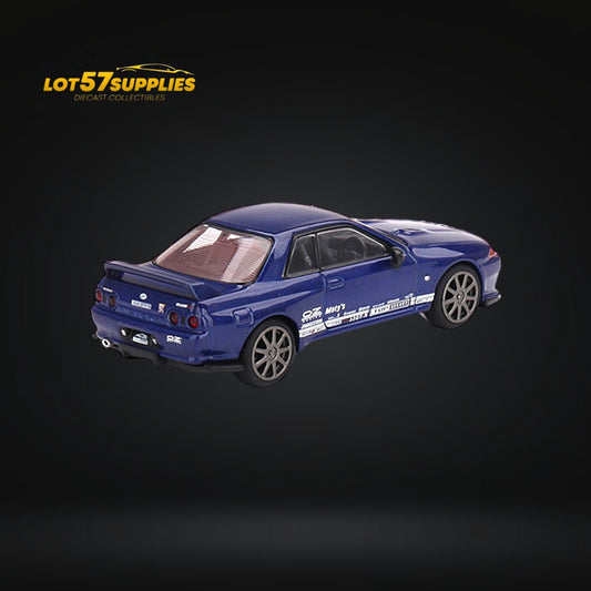 Mini-GT Nissan Skyline GT-R R32 in metallic blue, 1:64 diecast model by Lot57Supplies Diecast Shop, detailed and realistic.