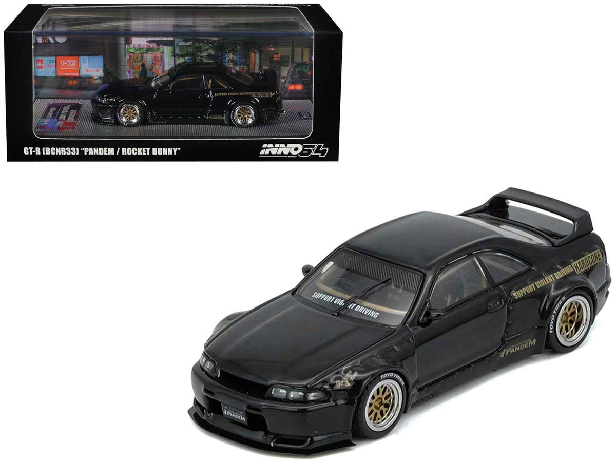 Black Nissan Skyline GT-R (BCNR33) RHD diecast model car by Miniature Motors, detailed 1/64 scale with Pandem Rocket Bunny kit.