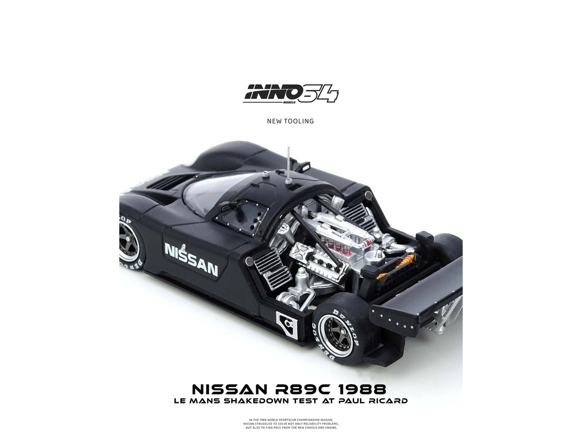 Miniature Motors Nissan R89C diecast model car in matte black, showcasing the Le Mans shakedown test at Paul Ricard 1988.