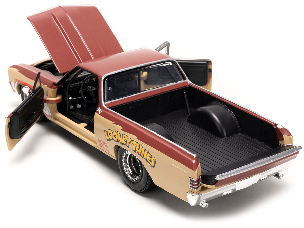 Brown and beige 1967 Chevrolet El Camino diecast model with Taz graphics from the Hollywood Rides series by Jada.