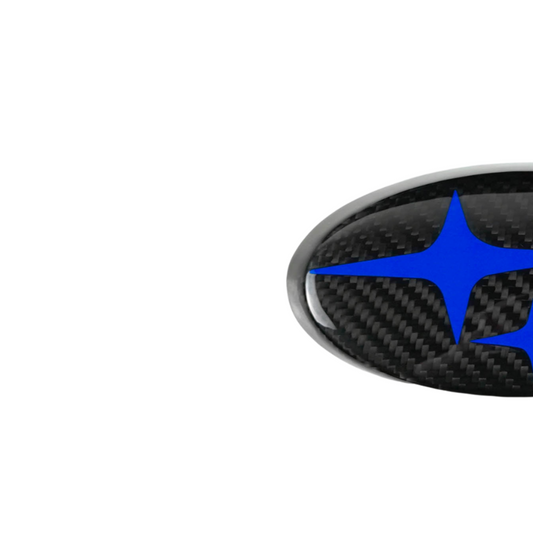 JDMuscle carbon fiber Subaru emblem covers for 2015-2023 WRX and STI, front and back ornament with red, white, and blue accents.