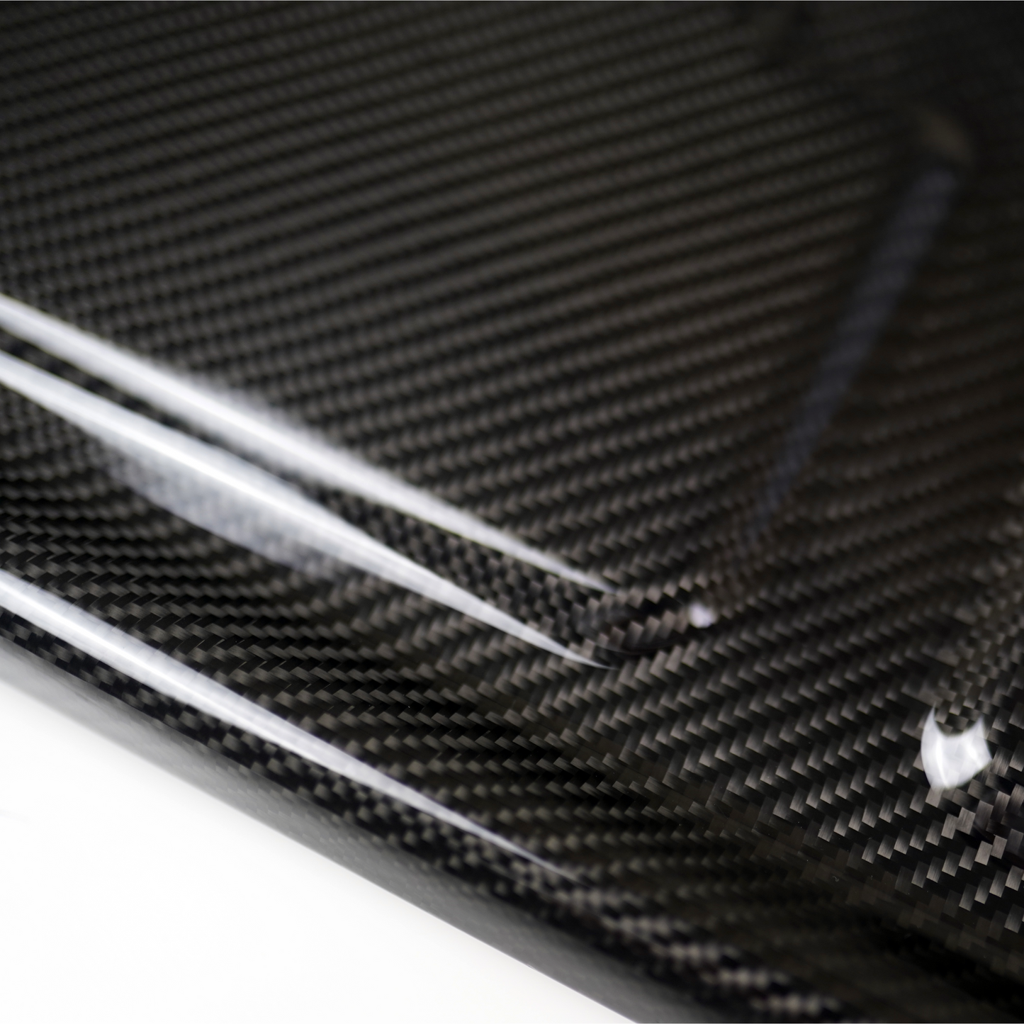 JDMuscle carbon fiber license plate backing for 2022-2025 Subaru WRX, exterior garnish with textured carbon fiber finish.