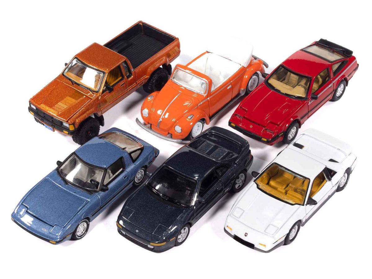 Set of six 1/64 scale diecast model cars from the Classic Gold Collection by Johnny Lightning, manufactured by Miniature Motors.