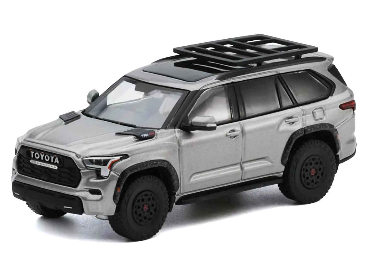 Silver metallic Toyota Sequoia TRD PRO diecast model by Miniature Motors, with roof rack, detailed toy car, 1/64 scale.