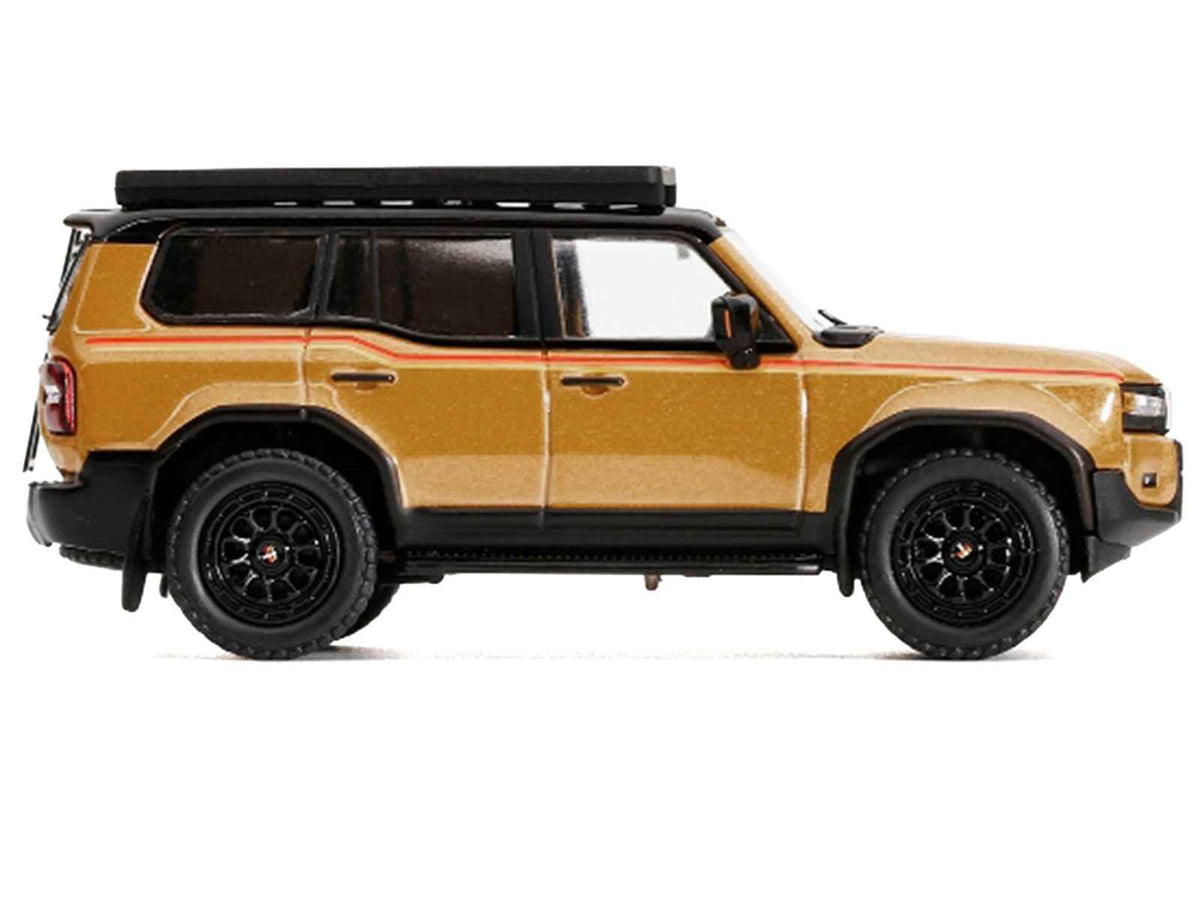 Miniature Motors 2024 Toyota Land Cruiser Prado diecast model in gold metallic with red stripes and roof rack, 1/64 scale.