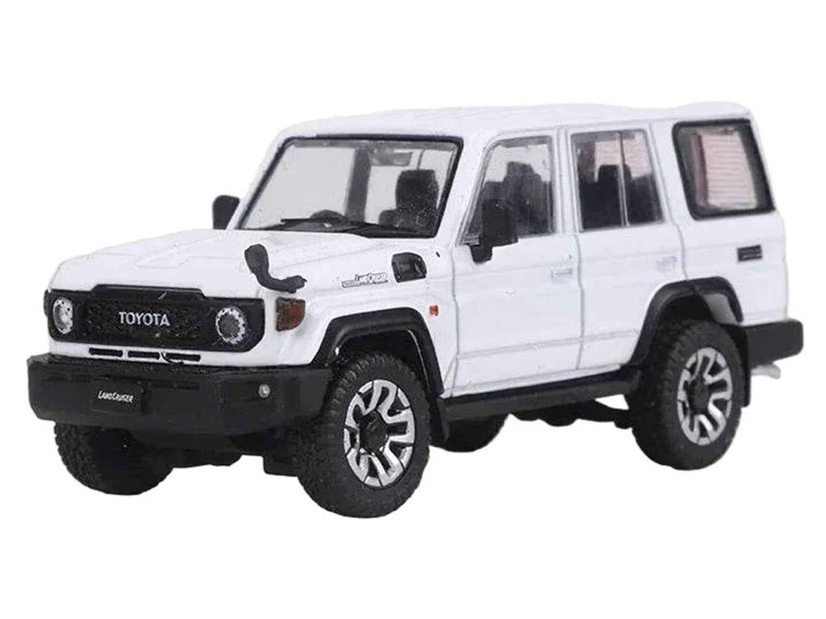 White Toyota Land Cruiser J76 diecast model car in 1/64 scale by Miniature Motors, shown from a side view.