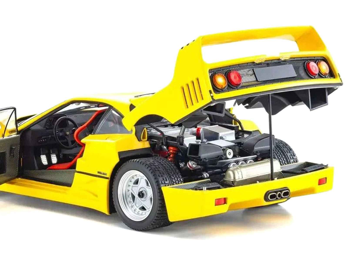 Yellow Ferrari F40 diecast model car in 1/18 scale by Kyosho, detailed miniature Ferrari model from Miniature Motors.