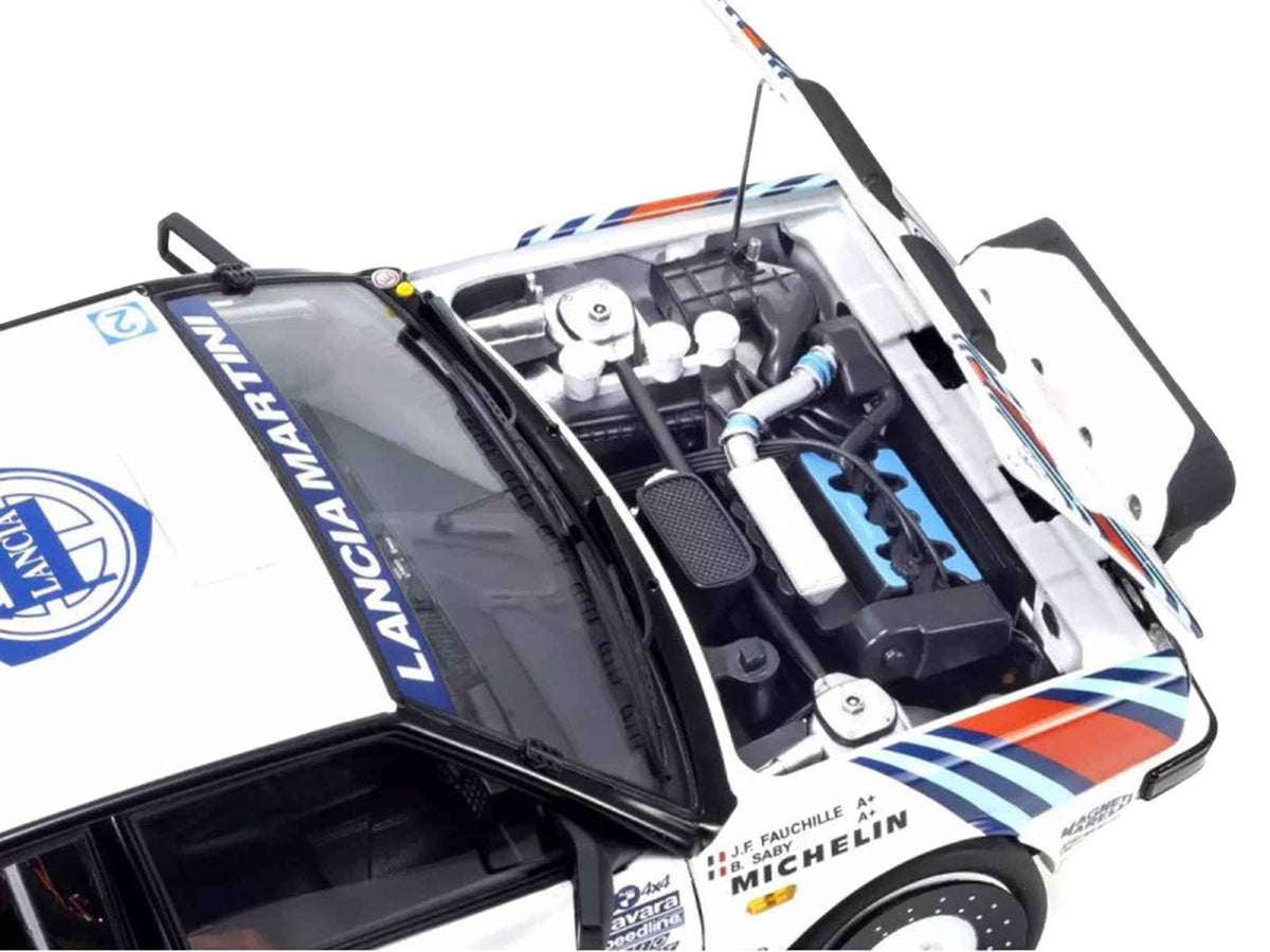 Lancia Delta HF 4WD Martini Racing diecast model car by Kyosho, miniature rally car for collection, detailed replica of 1988 Monte Carlo winner