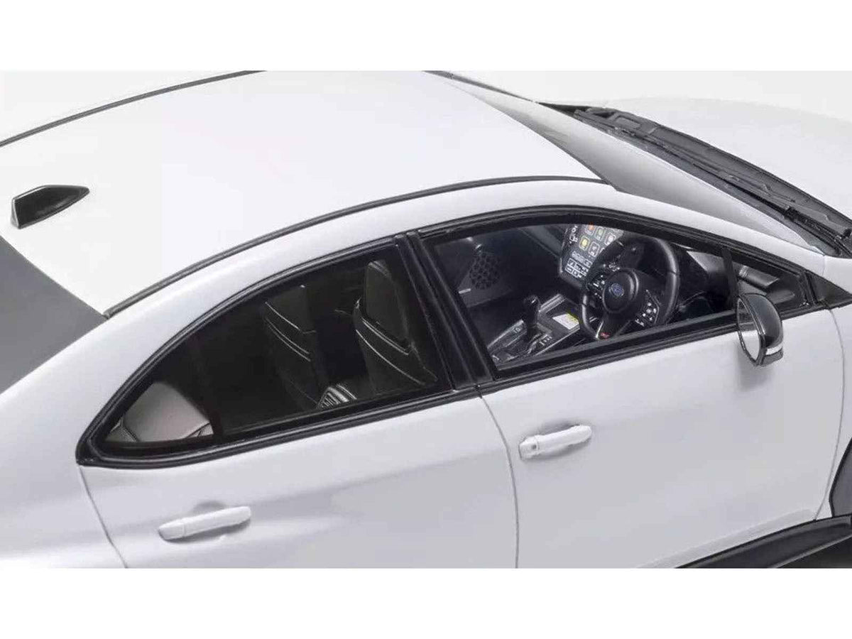 White Subaru WRX S4 STI Sport 1/18 scale model car by Kyosho, detailed miniature replica of Subaru's sporty vehicle.