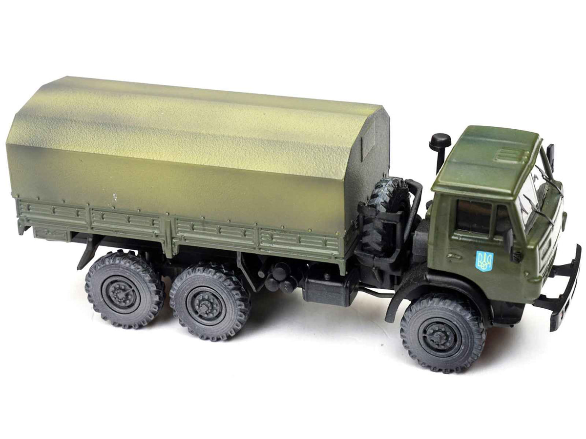 Weathered green Kamaz 4310 transport truck diecast model by Miniature Motors, representing Ukrainian Ground Forces, 1/72 scale.