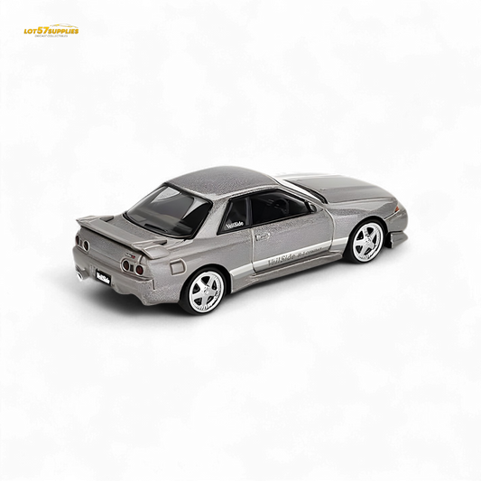 Mini GT Nissan Skyline GT-R R32 Veilside Combat grey diecast model, 1:64 scale, showcasing detailed design and vibrant paint.