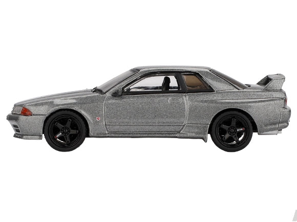 Dark metal gray Nissan Skyline GT-R NISMO BNR32 CRS model car by Miniature Motors, detailed 1/64 diecast Nissan model, RHD edition
