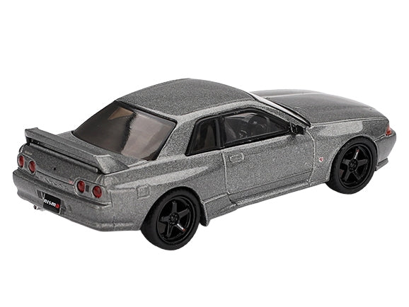 Dark metal gray metallic Nissan Skyline GT-R NISMO BNR32 diecast model car by Miniature Motors, RHD, limited edition 1/64 scale.