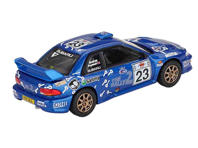 Mini GT Subaru Impreza WRC99 #23 Richard Burns diecast model car, detailed 1/64 scale replica of rally car on display.