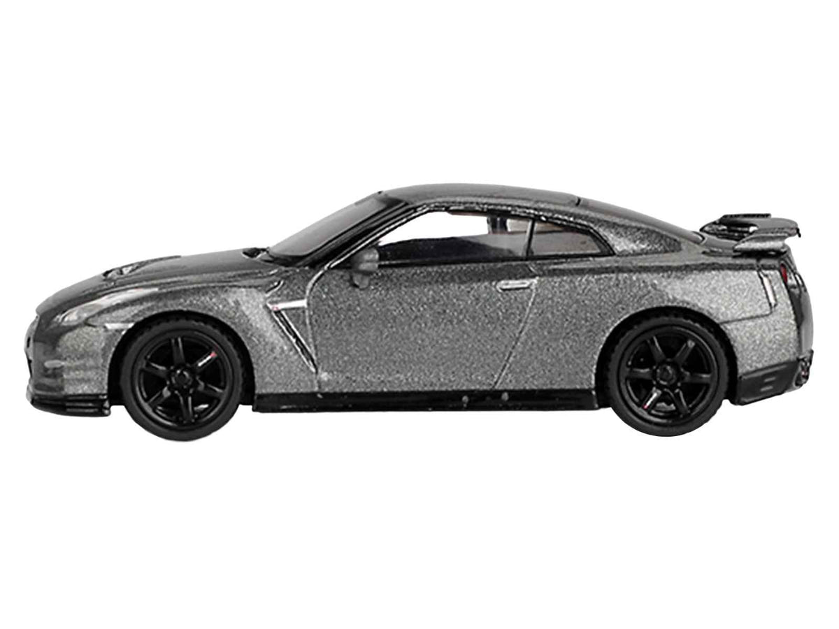 Miniature Motors Nissan GT-R Nismo R35 CRS Limited Edition diecast model car in dark metal gray metallic, right-hand drive, 1/64 scale